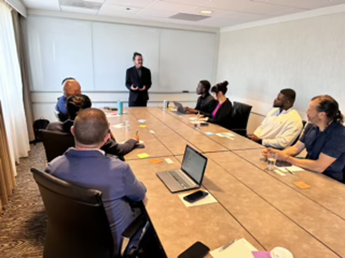 Alex Feldman facilitating a small group session
